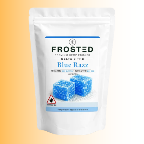 A white stand-up pouch of Frosted Premium Hemp Edibles Blue Razz Delta 9 THC, featuring a label with blue text and an illustration of two blue sugar-coated gummies, set against a warm yellow-to-white gradient background.