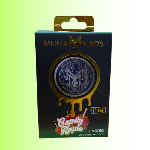 Muha-Meds Candy Apple THC-A hybrid packaging on a green background. For customers in the Kenosha and Racine area
