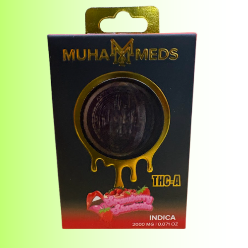 Muha Meds THC-A packaging, flavor Strawberry Shortcake with a black disc and colorful graphics on a green background. For customers in the Kenosha and Racine area