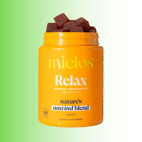 Orange container of 'mielos Relax' gummies with peach flavor on a green background. For customers in the Kenosha and Racine area