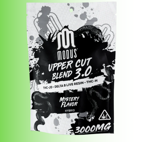 Modus Upper Cut Blend 3.0 Mystery flavor packaging with black and white design on a green background. For customers in the Kenosha and Racine area