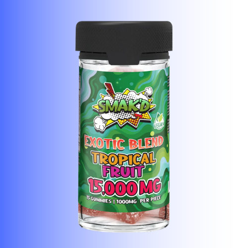 A bottle of Smaekd Exotic Blend Tropical Fruit gum, 15000mg strength, with a black cap and a green graphic label, set against a blue-to-white gradient background.