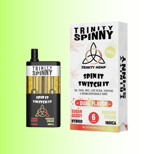 Trinity Spinny vape device and packaging on a gradient background. For customers in the Kenosha and Racine area